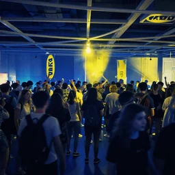 dark psychedelic blue and yellow rave happening in the middle of ikea