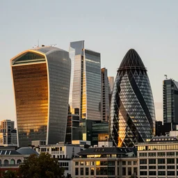 london skyline in the style of art deco, gold and black, realistic