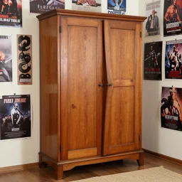 large armoire with slightly crooked door in a room full of posters