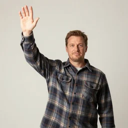 a man wearing flannel waving hello with a 9 foot long arm
