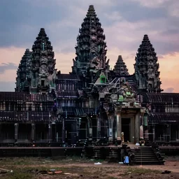 a dramatic cyberpunk scene of angkor thom at dusk, photorealistic, blade runner, highly detailed