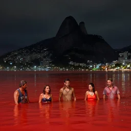 rio de janeiro flooded with red colored water, at night, 4 k, rtx, volume light, concept, studio matte painting, artstation, artur tarnowski, mihai muscan, marcin tomalak, marta leydy, marcin stepien, charlotte hughes