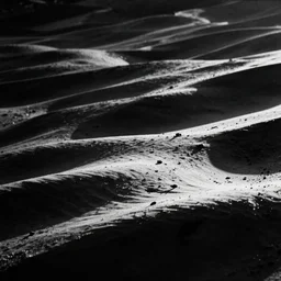 b&w 35mm lost footage photography, some light lots of darkness, unclear what it is
