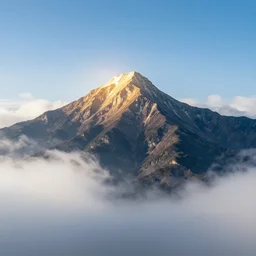 a mountain floats in the clouds and shines brightly
