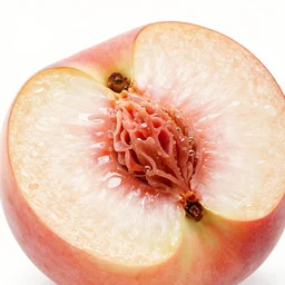 low angle extreme close up of a juicy peach cut in half on a cutting board in a kitchen. warm studio lighting, 8 k, 4 k, high quality