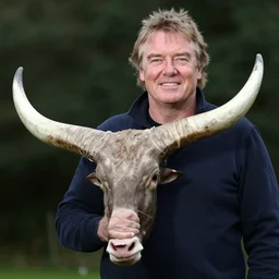 Jeremy Clarkson holding a big horn.