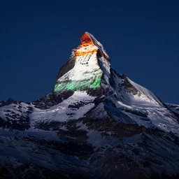 illumination of the matterhorn in the colors of indian flag, projected illuminated on the matterhorn mountain at night