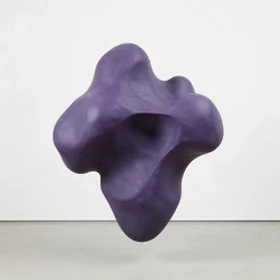 an abstract sculpture in purple wax by matthew barney floating in jean prouve design