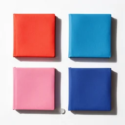 flatlay magic book collection, vivid colors, dramatic lighting, minimalist and clean, white glass beads