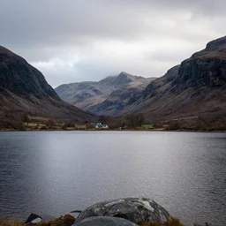 scottish mountains behind loch