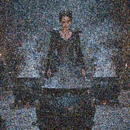 Amber Heard is an evil sorceress standing in back of a smoking black cauldron.