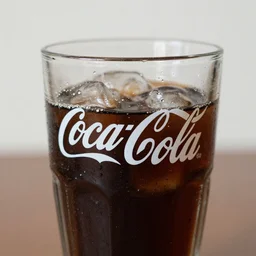 “close up 4k shot of a coca cola glass”