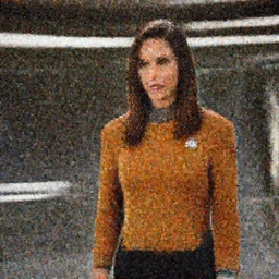 a scene from Trouble with Tribbles, an episode of the original Star Trek series, with Gal Gadot, in Starfleet uniform, in the role of Captain Kirk