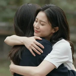 a tight hug between two couples, very warm and romantic scene