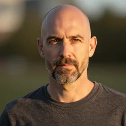 8k photography from a thin balded middle aged man with a short goatee beard , golden hour, Photography by Jimmy Nelson