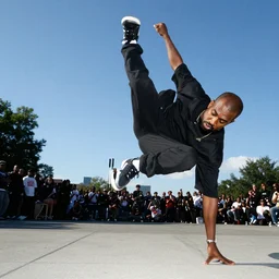 kanye west doing a kickflip