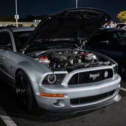 JDM 90s car meet dark night time 2013 Mustang cut hood exahust through the hood removed front bumper wangan