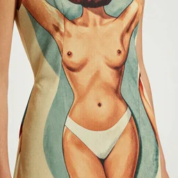 close up of a dress with print of a female body ,Photographed by Henry Clarke, Vogue, January 1965