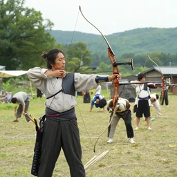film still from Ichirei Shite Kiss(2017) million japanese bows archery scene by Emmanuel Lubezki