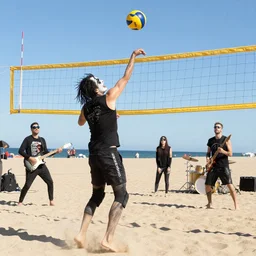 the band slipknot playing volleyball at the beach