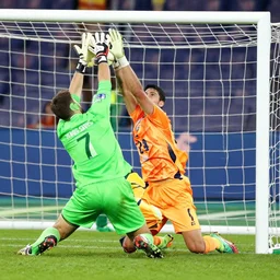 jesus saves, but he is a goalkeeper and he is saving a penalty