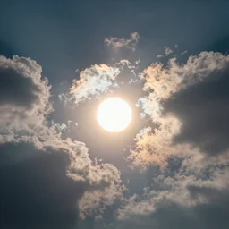 mystical sun, shining through sparkling heavenly clouds