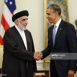 obama shaking hands with saddam, getty images