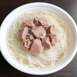 white pink meat chunks noodles in styrofoam bowl,