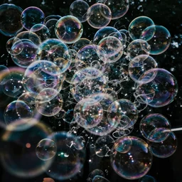 photo of soap bubbles made from balloons, extreme details, flash photo, high octane