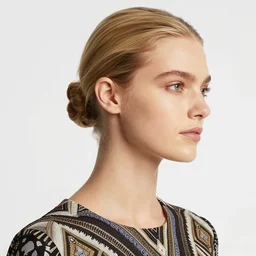 neck shot photograph of a blonde female model in her twenties, hair pinned up, wearing a designer top, looking content, photo realistic, extreme detail skin, natural beauty, no filter, slr, golden hour, 8 k, high definition, selfie