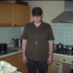 a headless man in a stalinist style kitchen, by mini dv camera, very very low quality, heavy grain, very blurry, accidental flash, webcam footage, found footage, security cam, caught on trail cam