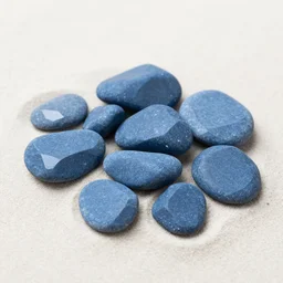 cool blue angular slate faceted sharp pebbles in the pale sand