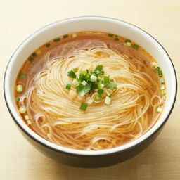 a photograph of a bowl of noddles