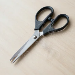scissors covered in fur, hair, fuzzy