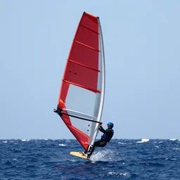 parasailor in outer space with a red sail