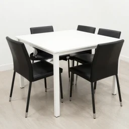 white table with black chairs