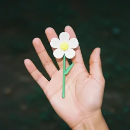 A hand with too many fingers holding a plastic flower, grainy old photo from 1970, n -9