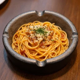 food photography of spaghetti in a used ashtray