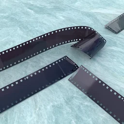 3D render of lightly separated 35mm film strips over a blue green marble with overhead lighting and an out of focus scenic overlook in the background
