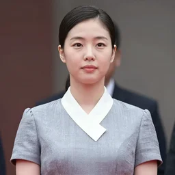 female kim jong un, wearing a dress