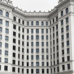 large square between tall buildings without windows. the palaces are decorated with friezes and statues large square between tall buildings without windows. the palaces are decorated with friezes and statues