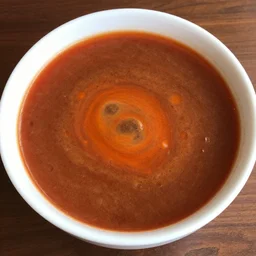 a bowl of soup that looks like Mars