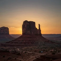 photo of monument valley as the sun is setting, deep focus, highly detailled, 8 k uhd, award - winning photography, moody setting