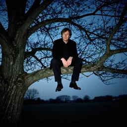 bert jansch perched up on a tree branch at night 2 0 meters in the distance, flash photography, haunted image