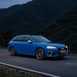 Denim Blue Audi A4 B9 Avant (2020) on a mountain road at night, wide shot