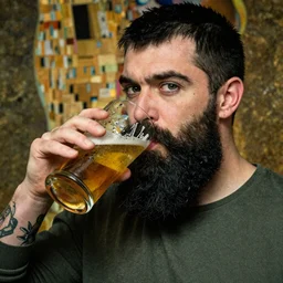 klimt long black two braided beard thick eyebrows  black short hair colin farrell drinking a pint of beer