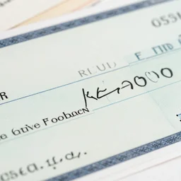 a closeup photo of a refund check