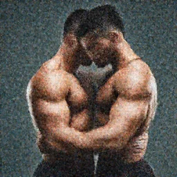 two muscular men in embrace