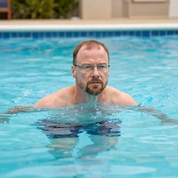 walter white swimming in a public swimming pool