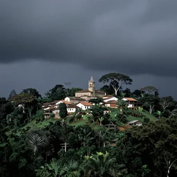 a small italian village on a hill, in the midst of the amazon forest. mediterranean architecture, huge tropical trees, dark, atmospheric, stormy weather, ansel adams 1 9 5 7